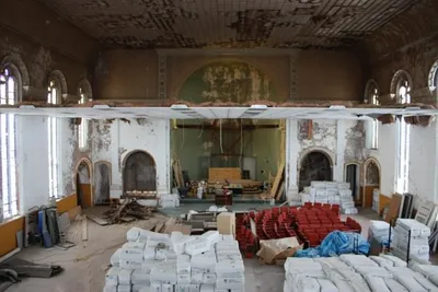 A local non-denominational community has purchased the church and begun to transform it into a religious performing arts center. This image is a good view of the makeshift ceiling installed below the actual ceiling, which was heavily damaged by leaking water. Source: Lighthouse Web site