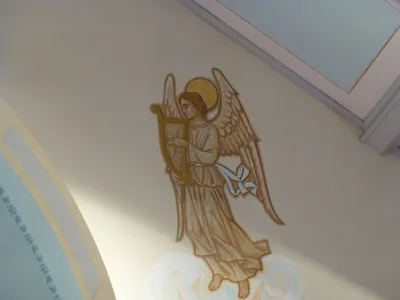 Angel painting above sanctuary.