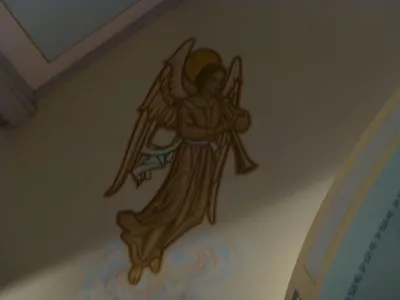 Angel painting above sanctuary.