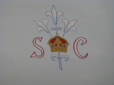 Crest on ceiling.