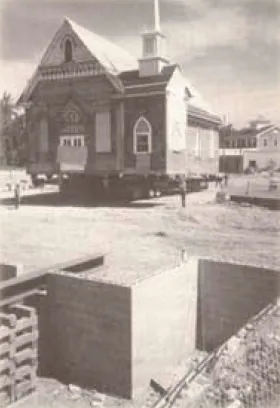 Moving the former church to make room for the present church. Source: One Hundred Years of Growth and Grace, Centennial Year 1902-2002
