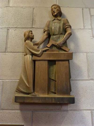 Christ child with St. Joseph relief.