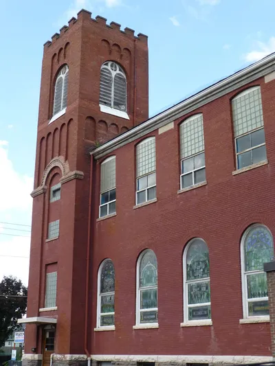 Bell tower seen from parking lot.