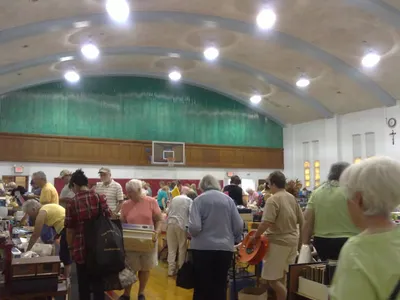 Interior of former church during a rummage sale, 2014.