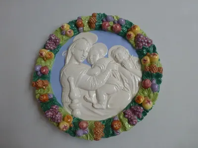 Ceramic relief of Our Lady with the Christ child.