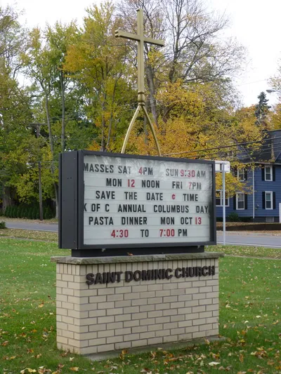 Church sign by the road.