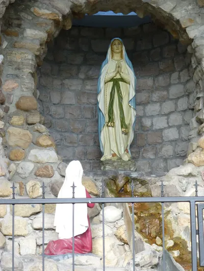 Statues of Our Lady of Lourdes and Saint Bernadette.