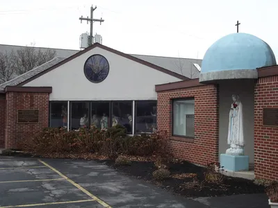 Outdoor shrines to the right of the church.