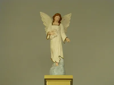 Angel atop baldacchino.
