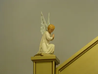 Angel atop baldacchino.