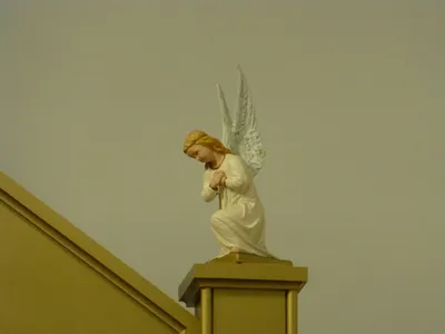 Angel atop baldacchino.