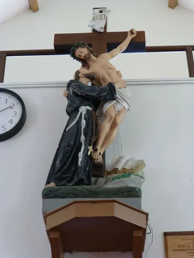 St. Francis with crucifix Christ statue.