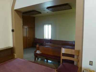 Seating to the right of the sanctuary.