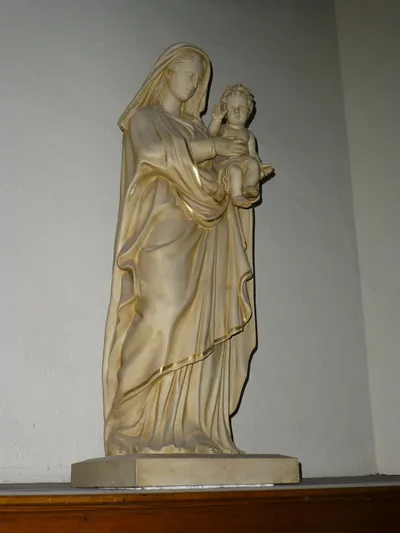 Statue of Our Lady with Christ child in the choir loft.