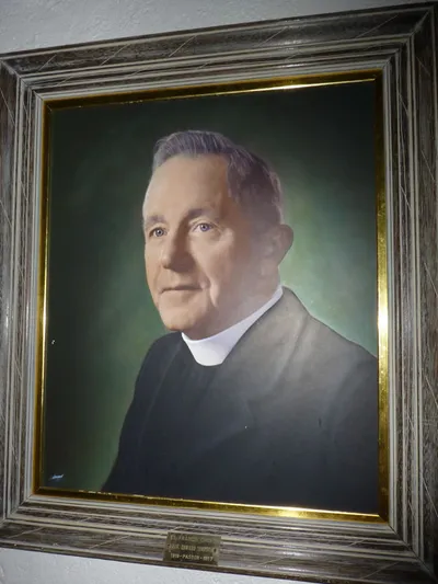 Painting of former pastor.