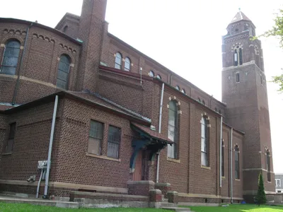 Left side of church.