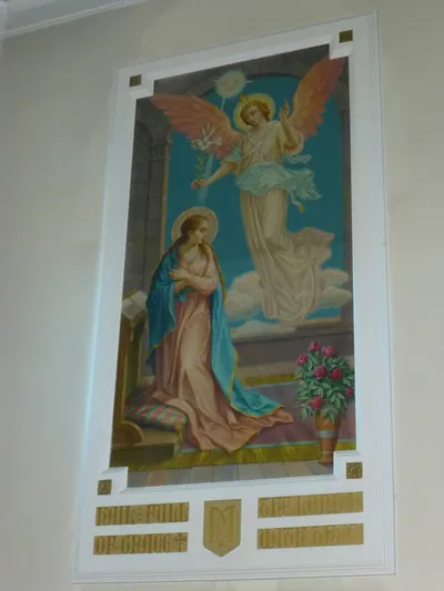 Annunciation painting on sanctuary wall.