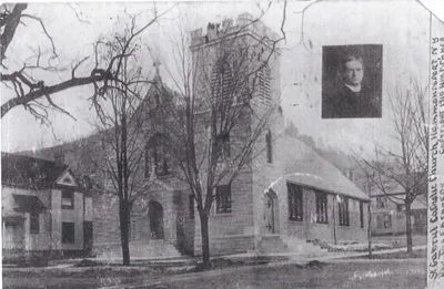 Exterior of church with a small photo of Fr. Kennedy, 1910. Source: Parish Web site
