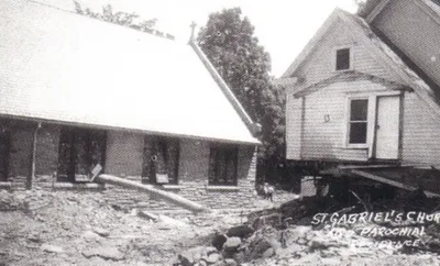 A log broke through one of the stained glass windows during a 1935 flood. Source: Parish Web site