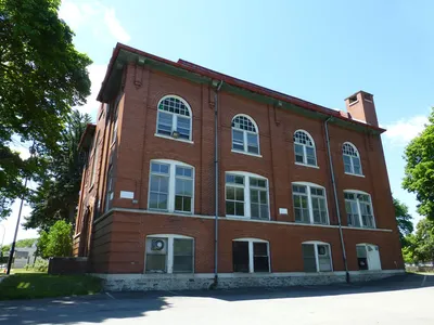 School seen from parking lot.