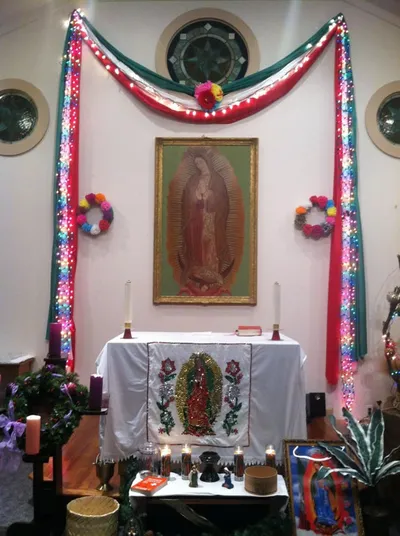 Interior of church on feast of Our Lady of Guadelupe, 2012. Source: Catholic Courier