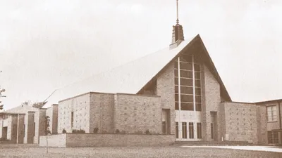 Exterior of present church as it appeared in 1963. Note the gathering space in front of the church has not yet been constructed. Source: From the Wilderness: Town of Gates Sesquicentennial, 1813-1963