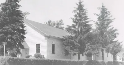 Exterior of original church, 1930s-early 1960s. 1987 parish directory.