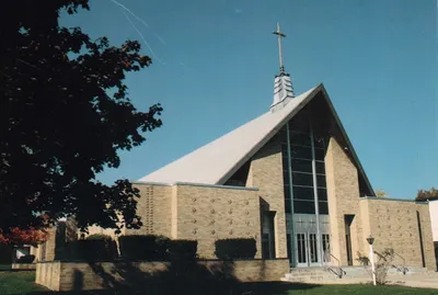 Church exterior, 1987. 1987 parish directory.