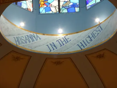 Inscription along dome.