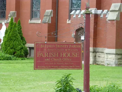 Sign outside parish house.