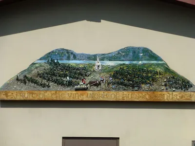 Artwork above entrance to parish hall.