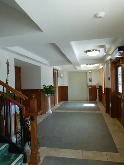 New, ground-level narthex.