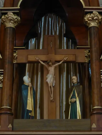 Crucifix atop high altar.
