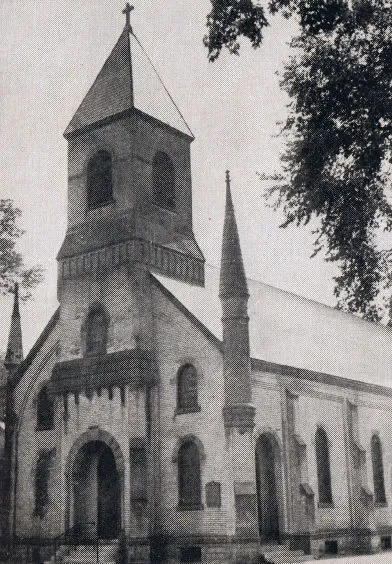 Exterior of church, 1939. Note the spire on the left side which is missing today. Source: Catholic Courier Golden Jubilee Edition: 1889-1939