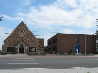 Former church and school. The school has been demolished and replaced by a car wash.