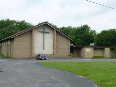 Former school. Religious items shop is located inside.