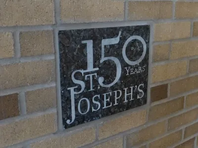 Cornerstone marking 150th anniversary.