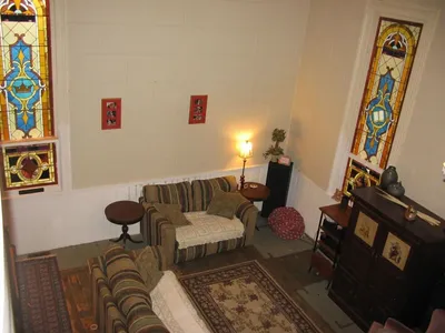 Interior today - one room remodeled for use as a home. Source: Zillow