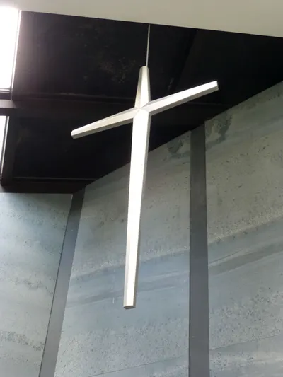 Cross above sanctuary.