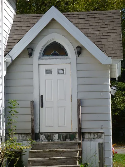 Side, parking lot entrance.