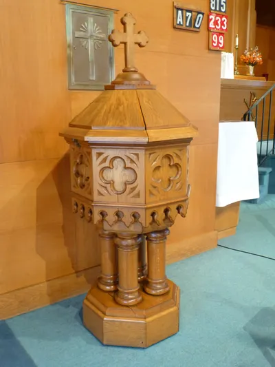 Baptismal font and ambry.