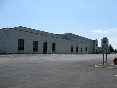 Church seen from back, left corner of parking lot.