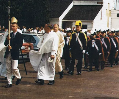 Procession from former church to new church, 1993.