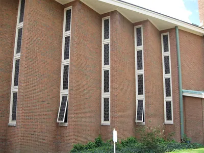 Left side of the church.