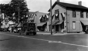 The parish worshipped in the second floor of the Tousey Market building on the corner of S. Main and Church beginning 1871. Source: A Home For All God's People: The Story of St. Louis Church, 1884-1999