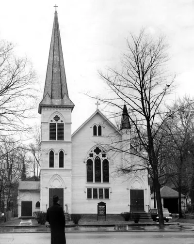 Exterior of first permanent church building, used from 1884-1966. It was demolished Apr. 25, 1968. Source: A Home For All God's People: The Story of St. Louis Church, 1884-1999