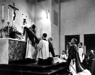 First Mass in present church. Source: A Home For All God's People: The Story of St. Louis Church, 1884-1999