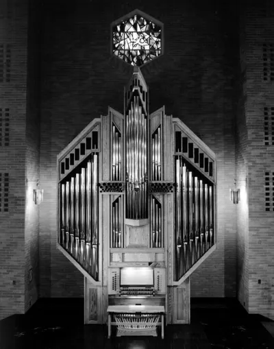 Sanctuary organ prior to moving to the choir loft, Sep. 1993. Source: A Home For All God's People: The Story of St. Louis Church, 1884-1999