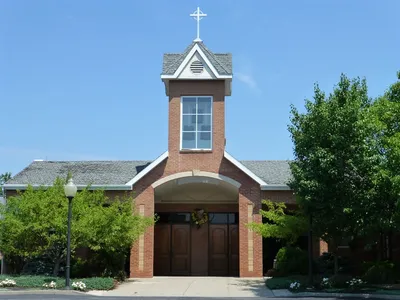 Main entrance and bell tower.
