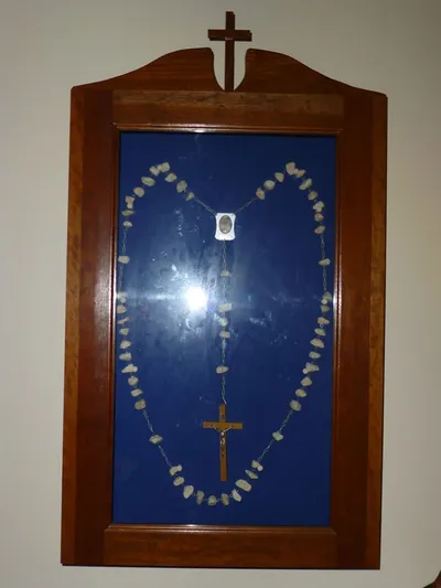 Rosary in case.